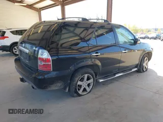 2006 Acura MDX Touring RES w/Navi with VIN 2HNYD18996H520308, listed as a IAAI auction lot 42040007 with 220,146 mi miles. Bid and sale history available at carsss.com. Image 4.