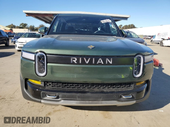 2023 Rivian R1T Adventure with VIN 7FCTGAAA7PN024633, listed as a Copart auction lot 41481365 with 24,965 mi miles and Salvage Title. Bid and sale history available at carsss.com. Image 5.