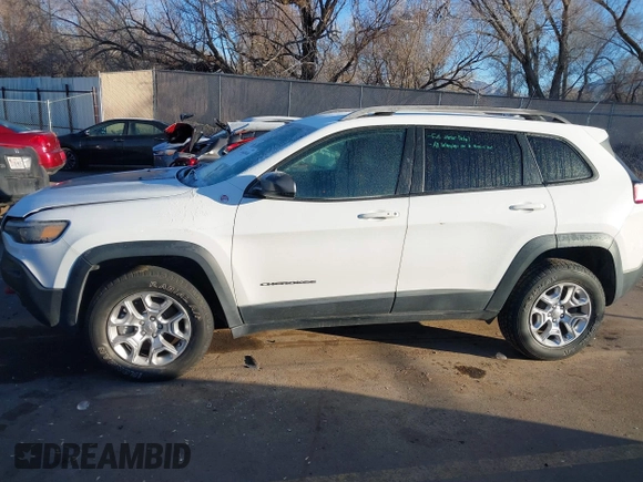 2019 Jeep Cherokee Trailhawk with VIN 1C4PJMBX8KD313712, listed as a IAAI auction lot 41448146 with 96,293 mi miles and . Bid and sale history available at DreamBid. Image 13.