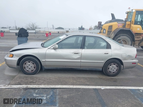 1997 Honda Accord Value with VIN 1HGCD568XVA184006, listed as a IAAI auction lot 41818518 with 276,230 mi miles and . Bid and sale history available at carsss.com. Image 14.