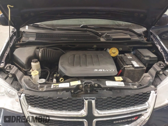 2015 Dodge Grand Caravan SXT with VIN 2C4RDGCG9FR632376, listed as a IAAI auction lot 41903984 with 238,723 mi miles and . Bid and sale history available at DreamBid. Image 10.