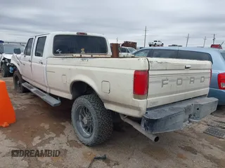 1995 Ford F-350 with VIN 1FTJW36H0SEA10003, listed as a IAAI auction lot 41959728 with 266,377 mi miles and . Bid and sale history available at DreamBid. Image 3.