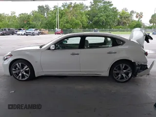 2018 Infiniti Q70 Luxe with VIN JN1BY1PP4JM330361, listed as a IAAI auction lot 42469866 with 69,986 mi miles and . Bid and sale history available at DreamBid. Image 14.