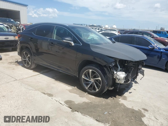 2016 Lexus RX 350 with VIN 2T2ZZMCA7GC012103, listed as a Copart auction lot 62763585 with 297,427 mi miles and Salvage title. Bid and sale history available at DreamBid. Image 4.