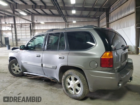 2005 GMC Envoy SLT z VIN 1GKDT13S652287033, wystawiony jako Copart lot #52508925 z przebiegiem 170 434 mil mil oraz Szkoda całkowita • Salvage title. Historia ofert i sprzedaży dostępna na DreamBid. Obrazek 2.