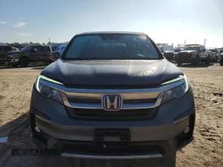 2021 Honda Pilot EX-L with VIN 5FNYF5H58MB001760, listed as a Copart auction lot 47061455 with 62,789 mi miles and Salvage Title. Bid and sale history available at carsss.com. Image 5.