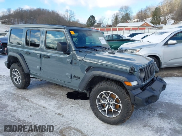 2024 Jeep Wrangler Sport S with VIN 1C4PJXDN2RW306332, listed as a IAAI auction lot 41036573 with 1,785 mi miles and . Bid and sale history available at DreamBid. Image 1.