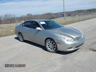 2002 Lexus ES 300 with VIN JTHBF30G725010406, listed as a IAAI auction lot 41821936 with 194,187 mi miles. Bid and sale history available at carsss.com. Image 1.