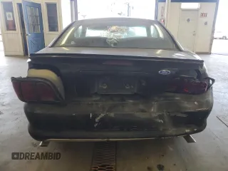1997 Ford Mustang with VIN 1FALP4047VF158249, listed as a Copart auction lot 55669455 with 175,458 mi miles and Salvage title. Bid and sale history available at DreamBid. Image 6.
