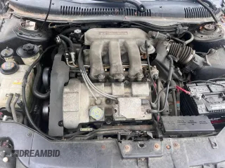 1999 Ford Taurus SE with VIN 1FAFP53SXXA145301, listed as a Copart auction lot 60351535 with 57,262 mi miles and Clean title. Bid and sale history available at DreamBid. Image 7.
