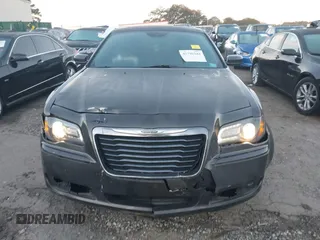2014 Chrysler 300 S with VIN 2C3CCABG2EH352220, listed as a IAAI auction lot 41796284 with 127,070 mi miles and . Bid and sale history available at DreamBid. Image 12.