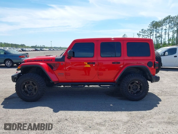 2020 Jeep Wrangler Unlimited Rubicon with VIN 1C4HJXFG9LW106607, listed as a IAAI auction lot 41908295 with 71,083 mi miles and . Bid and sale history available at DreamBid. Image 14.