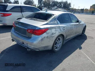 2015 Infiniti Q50 z VIN JN1BV7AP0FM332023, wystawiony jako IAAI lot #41960006 z przebiegiem 173 540 mil mil oraz . Historia ofert i sprzedaży dostępna na DreamBid. Obrazek 4.