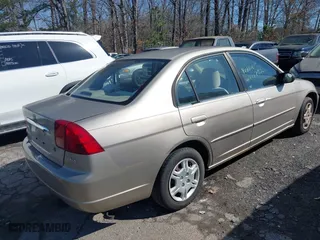 2002 Honda Civic LX with VIN 2HGES16642H550934, listed as a IAAI auction lot 41771762 with 207,727 mi miles. Bid and sale history available at carsss.com. Image 4.
