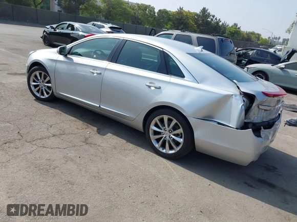 2014 Cadillac XTS Luxury with VIN 2G61N5S30E9294994, listed as a IAAI auction lot 42617654 with 159,573 mi miles and . Bid and sale history available at DreamBid. Image 3.