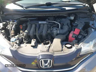 2015 Honda Fit EX-L z VIN 3HGGK5H86FM746265, wystawiony jako IAAI lot #42253205 z przebiegiem 75 491 mil mil oraz . Historia ofert i sprzedaży dostępna na DreamBid. Obrazek 10.