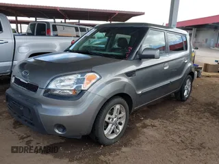 2010 Kia Soul + with VIN KNDJT2A28A7163141, listed as a IAAI auction lot 42035132 with 211,661 mi miles. Bid and sale history available at carsss.com. Image 2.
