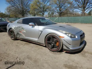 2009 Nissan GT-R Premium z VIN JN1AR54F89M252139, wystawiony jako Copart lot #52062915 z przebiegiem 73 483 mil mil oraz Szkody całkowita. Historia ofert i sprzedaży dostępna na DreamBid. Obrazek 4.