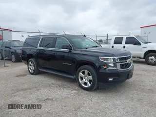 2016 Chevrolet Suburban LT with VIN 1GNSKHKC4GR233059, listed as a IAAI auction lot 42137869 with 115,571 mi miles. Bid and sale history available at carsss.com. Image 1.