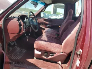 1998 Ford F-150 z VIN 1FTZF17W1WNA59477, wystawiony jako Copart lot #55849255 z przebiegiem 107 471 mil mil oraz Szkoda całkowita • Salvage title. Historia ofert i sprzedaży dostępna na DreamBid. Obrazek 7.