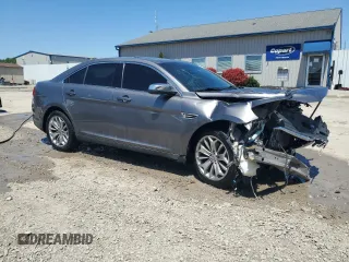 2013 Ford Taurus Limited with VIN 1FAHP2F85DG225363, listed as a Copart auction lot 56127255 with 128,660 mi miles and Salvage title. Bid and sale history available at DreamBid. Image 4.