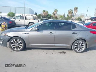 2015 Kia Optima SXL Turbo with VIN 5XXGR4A64FG458369, listed as a IAAI auction lot 42054396 with 143,750 mi miles and . Bid and sale history available at DreamBid. Image 14.