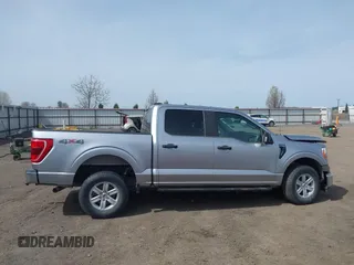 2021 Ford F-150 XL z VIN 1FTFW1E5XMFA28555, wystawiony jako IAAI lot #41814344 z przebiegiem 31 680 mil mil oraz . Historia ofert i sprzedaży dostępna na DreamBid. Obrazek 13.