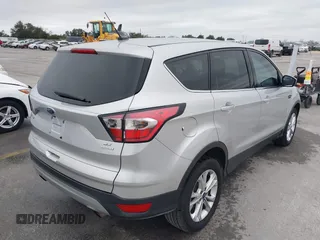 2017 Ford Escape SE with VIN 1FMCU0GD8HUC00733, listed as a IAAI auction lot 41576112 with 130,484 mi miles. Bid and sale history available at carsss.com. Image 4.
