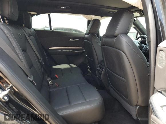 2024 Cadillac XT4 AWD Premium Luxury с VIN 1GYFZDR45RF222258, выставлен на аукционе Copart как лот 61138515 с пробегом 10 021 миль миль и Списание • Salvage title. История ставок и продаж доступна на DreamBid. Изображение 10.