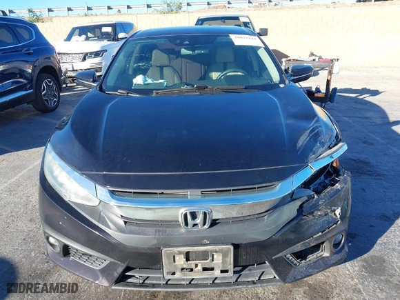 2016 Honda Civic Sedan Touring with VIN 19XFC1F99GE206092, listed as a IAAI auction lot 41031121 with 133,682 mi miles. Bid and sale history available at carsss.com. Image 12.