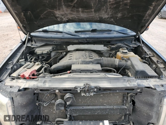 2013 Ford F-150 XL with VIN 1FTFW1ET0DKD05882, listed as a Copart auction lot 57662035 with 230,380 mi miles and Salvage title. Bid and sale history available at DreamBid. Image 11.