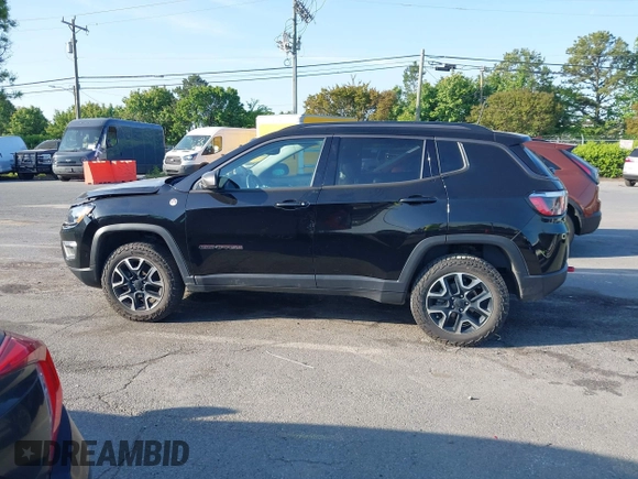 2019 Jeep Compass Trailhawk with VIN 3C4NJDDB5KT800515, listed as a IAAI auction lot 42059594 with 60,338 mi miles and . Bid and sale history available at DreamBid. Image 14.