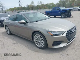 2019 Audi A7 Premium Plus z VIN WAUR2AF24KN114229, wystawiony jako IAAI lot #42126781 z przebiegiem 41 842 mil mil oraz . Historia ofert i sprzedaży dostępna na DreamBid. Obrazek 1.