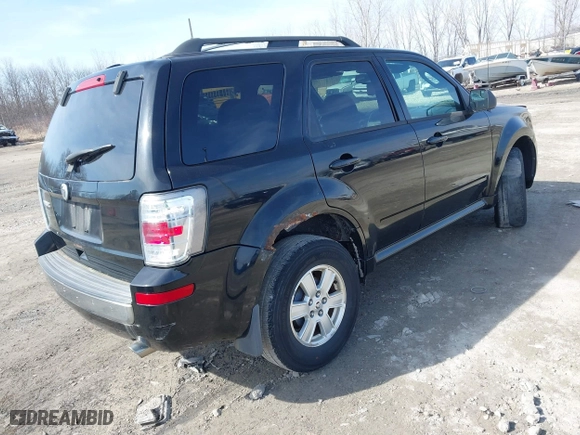 2010 Mercury Mariner with VIN 4M2CN8B79AKJ04672, listed as a IAAI auction lot 41736274 with 129,215 mi miles. Bid and sale history available at carsss.com. Image 4.