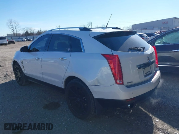 2011 Cadillac SRX Premium Collection with VIN 3GYFNCEY2BS624867, listed as a IAAI auction lot 41273945 with 209,296 mi miles. Bid and sale history available at carsss.com. Image 3.