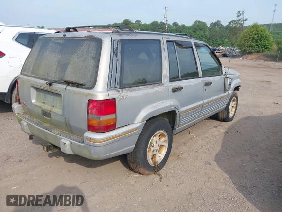 1994 Jeep Grand Cherokee Laredo z VIN 1J4GZ58Y1RC265589, wystawiony jako IAAI lot #42142226 z przebiegiem 138 656 mil mil oraz . Historia ofert i sprzedaży dostępna na DreamBid. Obrazek 4.