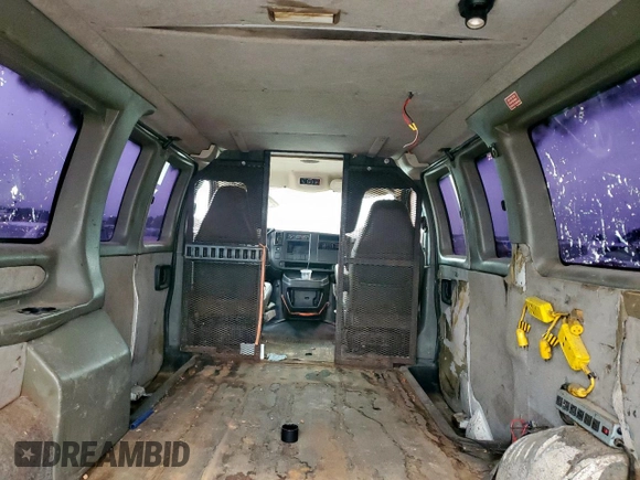2005 Chevrolet Express Cargo with VIN 1GCFG15T451189011, listed as a Copart auction lot 54563365 with 298,232 mi miles and Salvage Title. Bid and sale history available at DreamBid. Image 10.