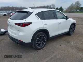 2022 Mazda CX-5 2.5 S Premium Plus Package with VIN JM3KFBEM2N0616960, listed as a IAAI auction lot 42127024 with 30,565 mi miles. Bid and sale history available at carsss.com. Image 4.