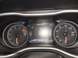 2016 Jeep Cherokee Trailhawk with VIN 1C4PJMBS2GW309042, listed as a IAAI auction lot 41564925 with 125,436 mi miles. Bid and sale history available at carsss.com. Image 7.