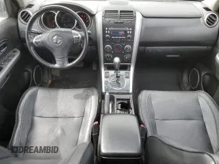 2012 Suzuki Grand Vitara Limited z VIN JS3TD0D74C4100965, wystawiony jako Copart lot #52727894 z przebiegiem 150 760 mil mil oraz Szkoda całkowita • Salvage title. Historia ofert i sprzedaży dostępna na DreamBid. Obrazek 8.