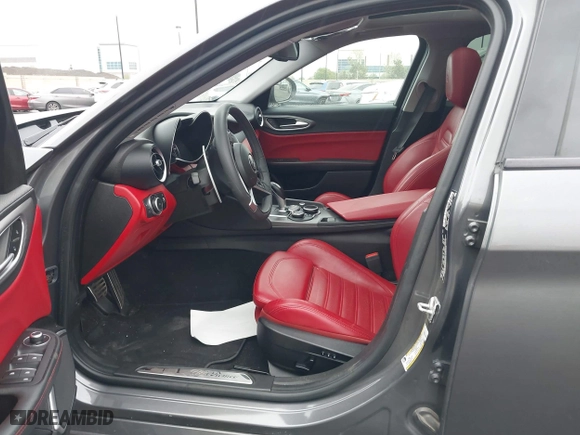 2019 Alfa Romeo Giulia Ti with VIN ZARFAMBN6K7607298, listed as a IAAI auction lot 42020714 with 67,469 mi miles. Bid and sale history available at carsss.com. Image 5.