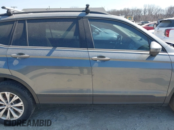 2018 Volkswagen Tiguan S with VIN 3VV0B7AX7JM104662, listed as a IAAI auction lot 41781658 with 235,461 mi miles and . Bid and sale history available at DreamBid. Image 14.