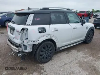 2018 MINI Countryman Cooper S z VIN WMZYT3C31J3D99568, wystawiony jako IAAI lot #42131017 z przebiegiem 54 992 mil mil oraz . Historia ofert i sprzedaży dostępna na DreamBid. Obrazek 4.