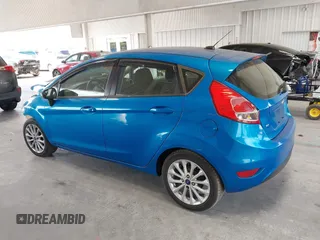 2014 Ford Fiesta SE with VIN 3FADP4EJ7EM204438, listed as a IAAI auction lot 42098291 with 184,930 mi miles and . Bid and sale history available at DreamBid. Image 15.
