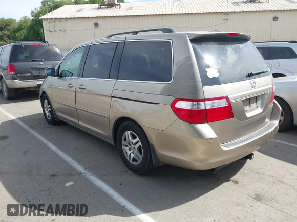 2005 Honda Odyssey EX-L z VIN 5FNRL38615B407908, wystawiony jako IAAI lot #42076045 z przebiegiem 170 950 mil mil oraz . Historia ofert i sprzedaży dostępna na DreamBid. Obrazek 3.