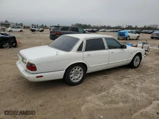 1998 Jaguar XJ with VIN SAJHX1248WC835728, listed as a Copart auction lot 86698244 with 116,768 mi miles and Clean Title. Bid and sale history available at carsss.com. Image 3.