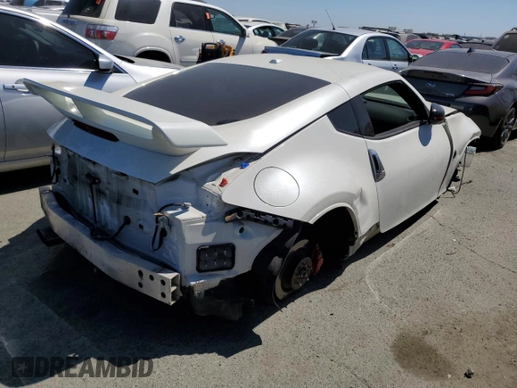 2016 Nissan 370Z with VIN JN1AZ4EH0GM933290, listed as a Copart auction lot 62025304 with 100,275 mi miles and Salvage Title. Bid and sale history available at carsss.com. Image 3.
