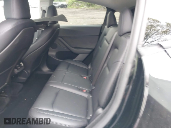 2024 Tesla Model Y Long Range z VIN 7SAYGDEE5RF130335, wystawiony jako IAAI lot #42250979 z przebiegiem 20 300 mil mil oraz . Historia ofert i sprzedaży dostępna na DreamBid. Obrazek 8.