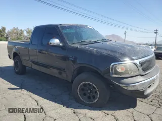 2000 Ford F-150 XL with VIN 1FTRX17W7YKB44552, listed as a Copart auction lot 72790504 with 0 mi miles and Salvage Title. Bid and sale history available at carsss.com. Image 4.