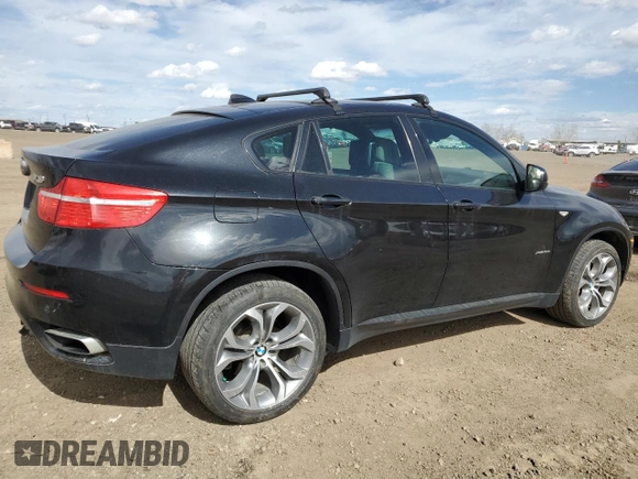 2012 BMW X6 50i z VIN 5UXFG8C59CLZ97450, wystawiony jako Copart lot #55281205 z przebiegiem 188 625 mil mil oraz Czysty tytuł • Clean title. Historia ofert i sprzedaży dostępna na DreamBid. Obrazek 3.